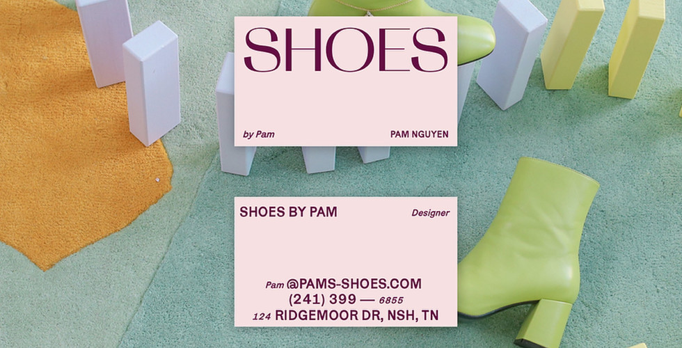 A pink business card for a company called "Shoes by Pam". The front and back of the card are shown over a background image of a green carpet with light green heeled boots and blue building blocks on it.